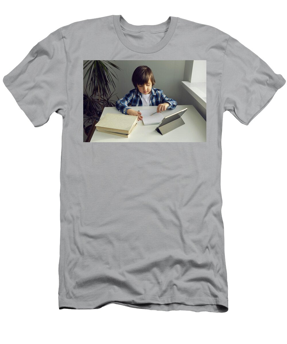 2 Boy Child Sits At a Desk and Learns with a Tablet Notebook and Book Elena Saulich T-Shirt