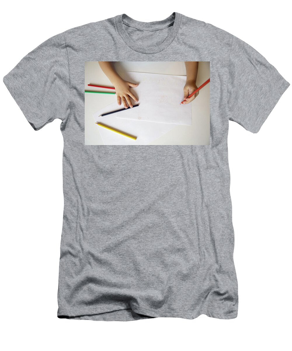 3 Boy Child in a Blue on a Yellow Background Sits At a White Table and Draws with Colored Pencils Elena Saulich T-Shirt