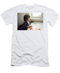 4 Boy Child Draws on Paper with a Ruler on a Table Sitting By the Window Elena Saulich T-Shirt