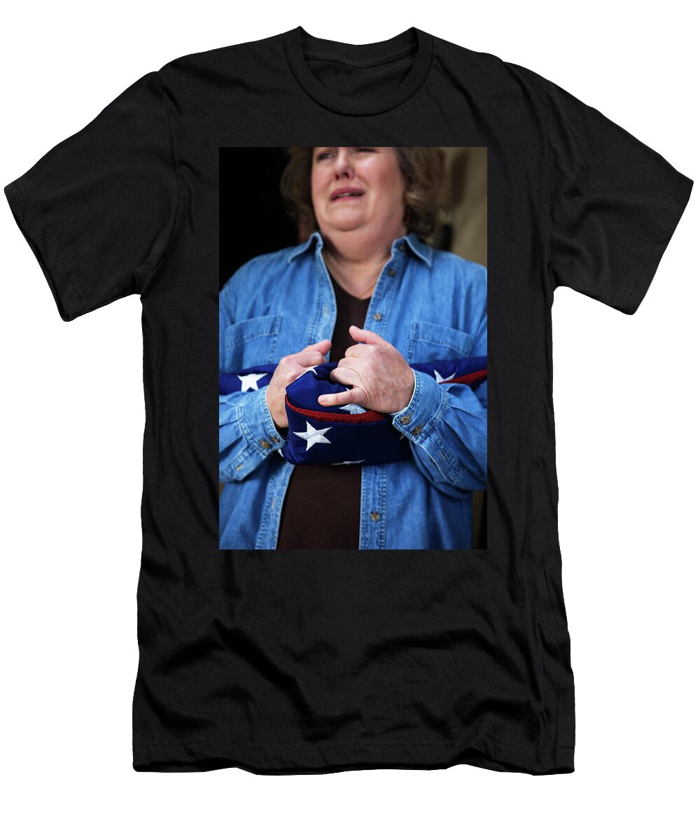 A Grieving Middle Aged Mother Clutching Ron Koeberer T-Shirt