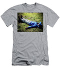 A Man Laying Down on the Ground Ron Koeberer T-Shirt