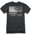 A Rusting Old Trailer Chassis Parked in a Corner of a Field with Felled Tree Stump Debris Jules Walters T-Shirt