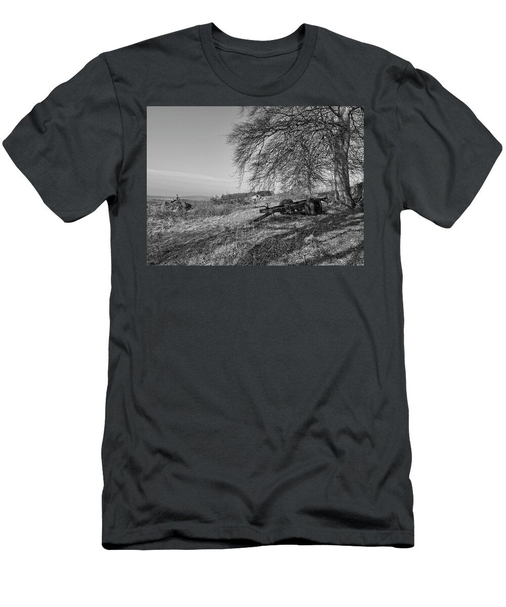 A Rusting Old Trailer Chassis Parked in a Corner of a Field with Felled Tree Stump Debris Jules Walters T-Shirt