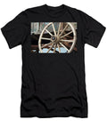 A Wheel and Undercarriage of a Buckboard Wagon Derrick Neill T-Shirt