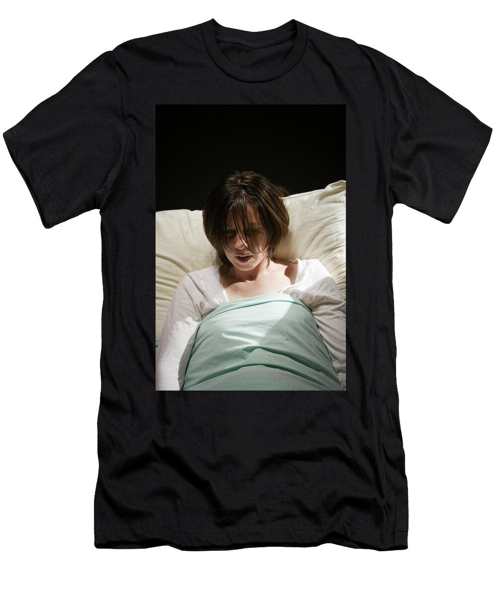 A Woman Lying in a Hospital Bed Ron Koeberer T-Shirt