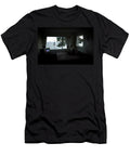 A Woman Watches Tv in Her Hotel Room Elyse Butler T-Shirt