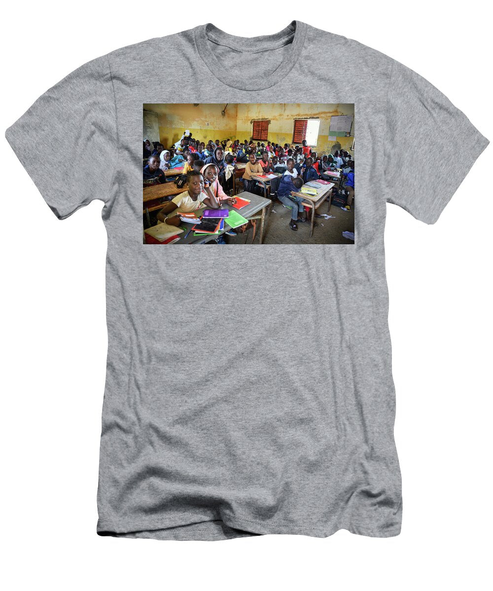 African Children Sitting At Their Desks in a Classroom in a Primary School Miroslav Liska T-Shirt