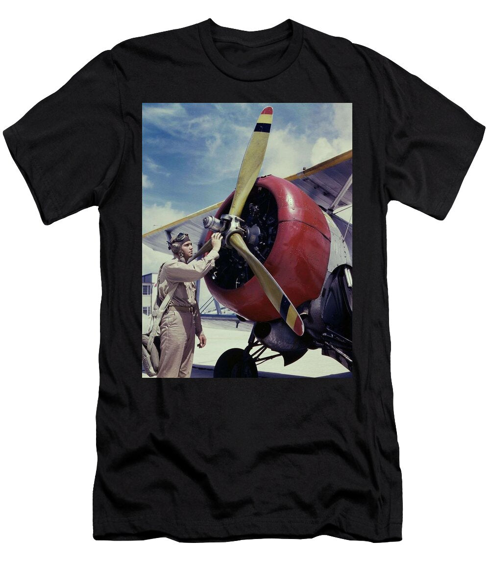 Aviation Cadet Thanas Inspects an Airplane Engine 1942 Naval Air Station Corpus Christi By Howard Howard R Hollem T-Shirt