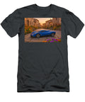 Blue Sports Car in Rustic Village Bruce Roker T-Shirt