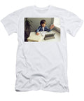 Boy Child Sits At a Desk and Learns with a Tablet Notebook and Book Elena Saulich T-Shirt