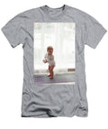 Child a Girl in White Clothes Stands At the Window in Winter on the Radiator Elena Saulich T-Shirt
