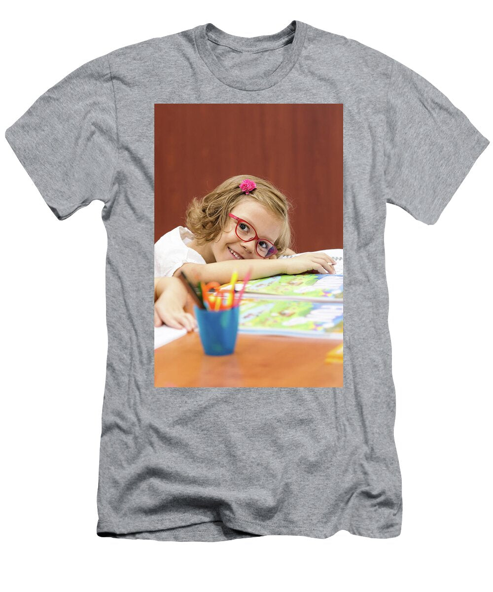Education and School Concept Smiling Little Student Girl with Glasses Doing Homework for School Dan Rentea T-Shirt