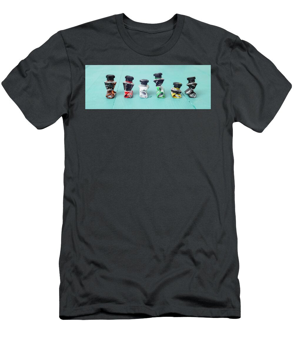 Empty Rolled Aint Tubes on Turquoise Background Dorin Puha T-Shirt