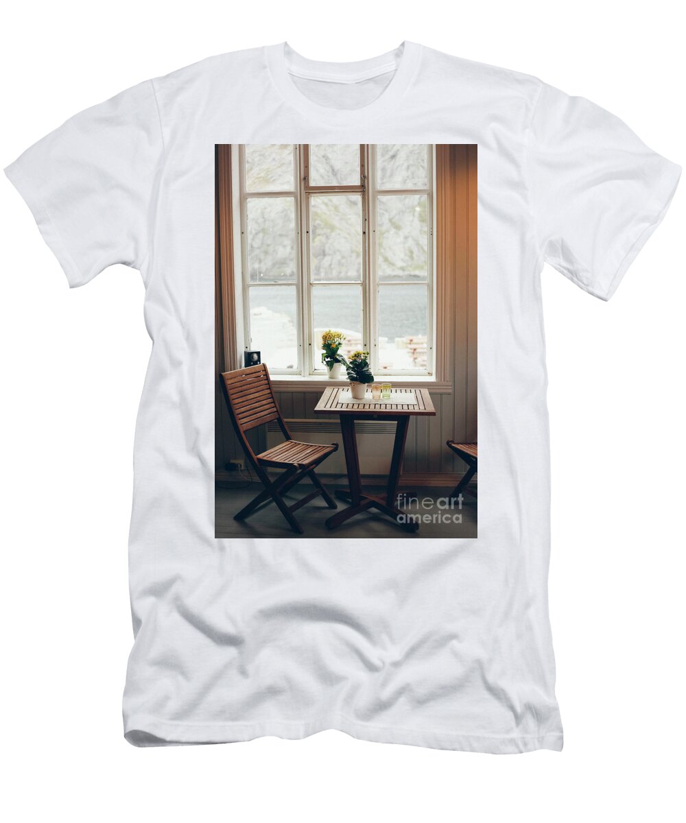 Empty Table and Antique Wooden Chairs Near a Window Joaquin Corbalan T-Shirt