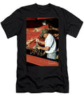 Farmer Adjusts a Hydraulic Connection Inga Spence T-Shirt
