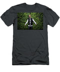 Handsome Young Man Posing on a Green Bush Background Felix Mizioznikov T-Shirt