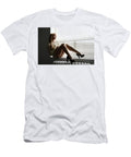 Melancholy Women in High Heels Sitting on a Ledge Looking Out Th Reimar Gaertner T-Shirt