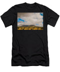Mountain Landscape Under a Dramatic Sky Mario G Rivera T-Shirt
