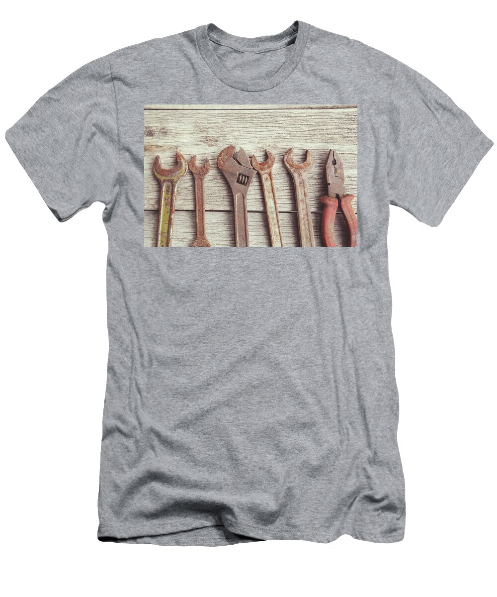 Old Rusty Tools on Wooden Background Michael Dechev T-Shirt