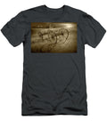 Sepia Tone Photograph of a Farm Wagon Chassis in a Grassy Field Randall Nyhof T-Shirt