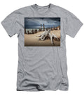 Tree Stump and Pilings on the Beach Randall Nyhof T-Shirt